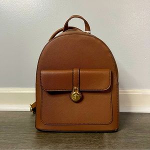 Brown convertible backpack golden zipper